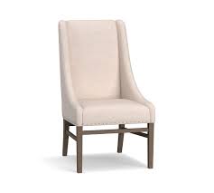 Our upholstered nailhead dining room chairs serve as a dining room accent or comfortable dining table seating. Milan Slope Upholstered Dining Armchair Pottery Barn