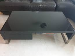A sleek coffee table makes takeout dinner at the end of a long day that. Sleek Black Coffee Table Furniture Home Living Furniture Tables Sets On Carousell