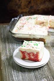Cake with jello drizzles poked throughout, and topped with a smooth layer of whipped cream! Christmas Poke Cake Moore Or Less Cooking