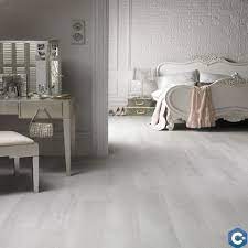 White Laminate Flooring From Lowes White Flooring Is Staple For Shabby Chic Look White Laminate Flooring Bedroom Flooring White Wood Floors