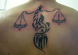Sometimes a hand may be shown as holding the scales. 40 Extraordinary Libra Tattoos Design That Will Make You Want One