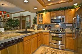 To tone down the warmth of oak cabinets, outfit the rest of the kitchen in cool refreshing tones such as blues or greens. Kitchen Kitchen Renovation Kitchen Design Oak Kitchen Cabinets