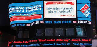 Pie In The Sky Domino S Flips Switch On Times Square Instant Reviews Takes Transparency To New Level Domino Reviews Times Square