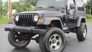 Image result for Brilliant Black 2005 Jeep