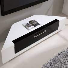 It has sturdy round section posts of steel. Editor Remix Corner Tv Stand In White By B Modern Corner Tv Stand Tv Stand Home Entertainment Furniture