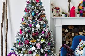 The ribbon, which i found on amazon, really. Christmas Tree Decorating Ideas For Every Style And Budget Loveproperty Com