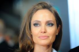 Check spelling or type a new query. On Set Hair Color News Angelina Jolie Is A Blond Charlize Theron Is A Redhead Glamour