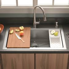 A sink stopper's purpose is to hold water within the basin of the sink by blocking the sink's drain opening. Kohler Cater Accessorized Kitchen Sink Costco