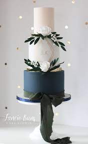 Bold Navy Tier With Gold Sparkle Grey Gold Hand Painted Geometric Design Loose Foliage White Geometric Wedding Cakes Wedding Cake Navy Gold Wedding Cake