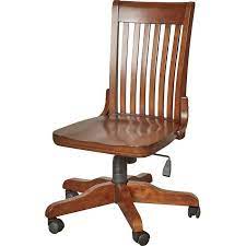 Featuring elegant, curved wooden walnut finish outside, with a faux leather button tufted padded seat on the inside, and a chrome base and caster wheels, this chair is as stylish as it is sturdy. Seger High Back Bankers Chair Chair Bankers Chair Wood Office Chair