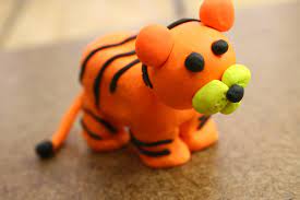 How To Make A Standing Tiger Out Of Clay 15 Steps With Pictures Making clay dogs is a fun activity, especially for children.