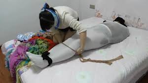 Chrissy Marie sexy Scarf Bondage Challenge in intense BDSM fun