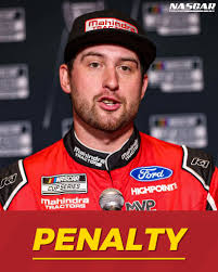 The No. 19 team assesses the damage to Chase Briscoe's car.