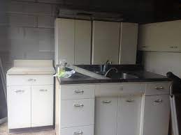 A simple thing like replacing the old handles. Best Images Metal Kitchen Cabinets Ideas Metal Cabinets Kitchen Cabinet