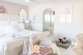 A glam and refined bedroom with a striped accent wall, black floral bedding, white ruffle curtains and exquisite. White Bedroom Decor Check 5 Wondrous White Bedroom Ideas