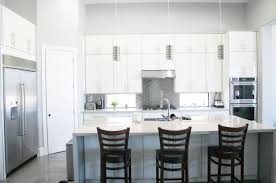 A Simplistic And Modern Frameless Acrylic Kitchen Metallic And Edge Banding On The Doors And The Silve Custom Kitchens Custom Kitchen Cabinets Custom Bathroom