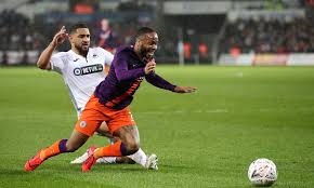 Riyad mahrez stars as leaders survive brief scare to extend winning run. Var May Not Have Prevented Manchester City Being Given A Penalty Against Swansea Daily Mail Online