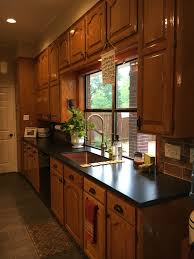 Updated Kitchen With New White Island Original Honey Oak Cabinets And A Touch Of Shiplap Love Your Honey Oak Cabinets Wood Countertops Kitchen Wood Kitchen
