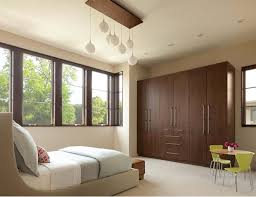 There are options in mirrored wardrobes too. 15 Bedroom Wardrobe Cabinets With Wooden Finishes Home Design Lover