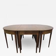 We are entering our third decade in the antique and fine furniture business. Hepplewhite Style Inlaid Demilune Three Part Banquet Dining Table