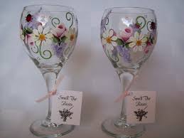 Hand Painted Wine Glass Designs Hand Painted Ladybug Garden Design Wine By Smelltheroseboutique Hand Painted Wine Glass Painting Glassware Painted Wine Glass