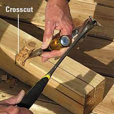 Cut about ¾ of the way through the tie holding your chainsaw steady. How To Install Deck Railing Posts Better Homes Gardens