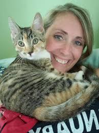 She's sitting right over there, I'd know that face anywhere. I'd run up and  embrace her but I'm ashamed to face her.