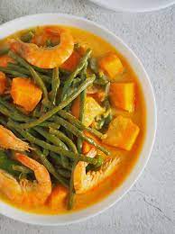 Ginataang hipon is a filipino recipe that consists of shrimps cooked in coconut milk. Ginataang Kalabasa At Sitaw With Shrimp Is A Tasty And Hearty Vegetable Dish You Ll Love With Steamed Rice It S R Fish Recipe Filipino Cooking Cooking Recipes