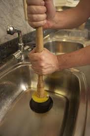 how to fix a slow draining kitchen sink