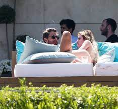 Scott disick is seen with girlfriend bella thorne as they sunbathe at a luxury villa in cannes, scott could resist squeezing bell's breast a the couple were seen all over each other in the sunshine.<p>pictured: Bella Thorne Leaves Cannes After Seeing Pictures Of Scott Disick With His Ex Slaylebrity