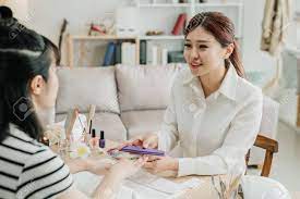 Our certified medical nail techs are professional, detailed and background checked. Manicure Procedure In Home Service Beautiful Manicurist Smiling And Looking At Customer While Using Nail Buffer On Girl Hands Confident Beautician Listening To Client Talking During Work Process Stock Photo Picture And