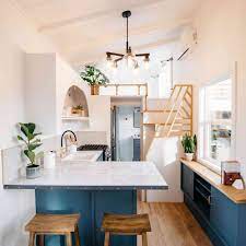 Roll this cabinet in or out as you need it. 15 Tiny Home Kitchens To Inspire You
