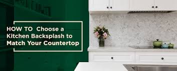 The subtle gray veining of the backsplash tile does not clash or compete with the granite's dramatic patterning, but rather enhances the white veining. How To Pick A Backsplash To Match Your Countertops