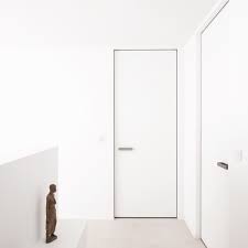 Frameless Interior Doors Custom Made By Anyway Doors The Built In Frame Is Installed Before The Walls Ar Doors Interior Doors Interior Modern Invisible Doors