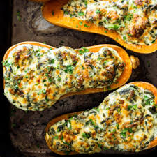 Creamed Spinach Stuffed Butternut Squash Simply Delicious Recipe Butternut Recipes Creamed Spinach Recipes