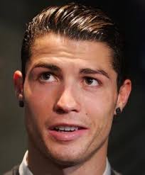 Sweep hair to one side, then twist the hair across the nape of the neck from one to the other and secure with a bobby pin. Ask Rogelio The Side Swept Curly Hairstyle Of Cristiano Ronaldo The Lifestyle Blog For Modern Men Their Hair By Curly Rogelio