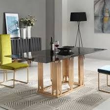 The transparent nature of glass often helps a room to look larger and its reflective surface adds light and brightness to the space. 10 Black Glass Dining Room Table Ideas Dining Room Table Dining Glass Dining Room Table