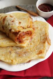 Lamb, chicken, fish, grains, vegetables, and jwaz is a favorite vegetable meal in algeria. Mahjouba Algerian Tomato Onion Filled Pancake Recipes International Recipes Algerian Recipes
