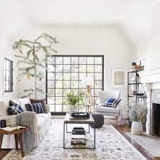 The color palette is neutral but the movement in the burlwood and in the base of the coffee table make it anything but boring and keeps that pair cohesive. The Ultimate Budget Friendly Living Room Furniture Roundup
