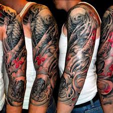 Koi which is the japanese word for carp has been a popular tattoo design for many years and still to this day remains popular amongst both men and women. Classic Black And Grey Japanese Koi Fish Tattoo On Man Left Half Sleeve