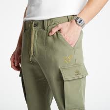 Frequently used for military uniforms, khaki is a loanword from the urdu. Hosen Und Jeans Adidas Human Made 5p Pants Raw Khaki