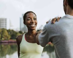 Image of two people making eye contact and smiling