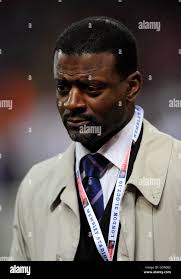 Former San Francisco 49ers safety Dwight Hicks, left, is embraced by former  tight end Brent Jones after they spoke about "The Catch" during a memorial  service at Grace Cathedral for 49ers great