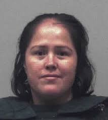 Woman charged in slayings of 4 children, father due in court