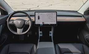 2021 tesla model 3 model description. 2020 Tesla Model 3 Review Pricing And Specs