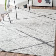 Add A Layer Of Eye Catching Pattern To Your Space With The Dervilla Area Rug A Tonal Waved Motif In A Versatile G Light Grey Area Rug Light Grey Rug Area Rugs