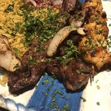 Beef marinated with special spices, slowly roasted, thinly sliced and rolled in a pita with sliced tomato, pickles, tahini sauce, hummus, onions and parsley. Ali Baba Mediterranean Cuisine 84 Photos 103 Reviews Mediterranean 139 Sundae Dr Rockford Il Restaurant Reviews Phone Number Menu