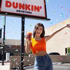 The day of the charli launch, downloads of the dunkin' app increased 57 percent from its average for the previous 90 days; Charli Damelio Dunkin Photos