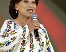 The second noteworthy success of this album was that mădălina manole became the first pop artist to interpret authentic romanian folklore in an original way, with a folk orchestra led by the late dorel manea. Maria Ciobanu Kfetele