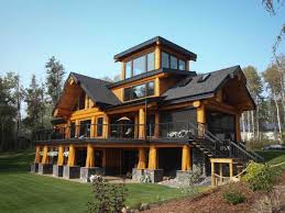 The houses fuse modernist ideas and styles with notions of the american western period working ranches to create a very informal and casual living style. Artisan Log Homes Handcrafted Canadian Custom Log Homes